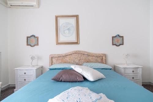 Una cama o camas en una habitación de Ilcovino