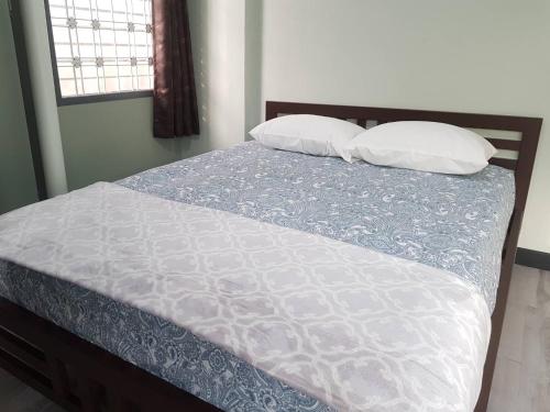 Cama o camas de una habitación en Baan U-Sabai บ้านอยู่สบาย