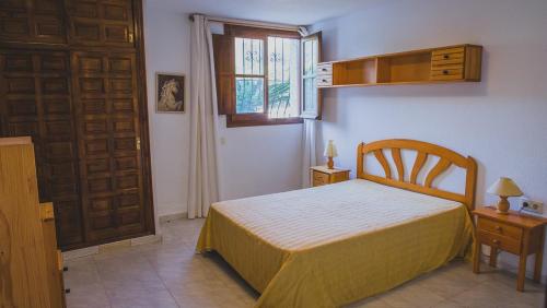 Villa Somni - Deniasol tesisinde bir odada yatak veya yataklar