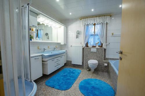 Ett badrum på Ferienhaus Simmeth