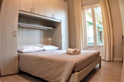 Llit o llits en una habitació de Affittacamere Stazione Empoli