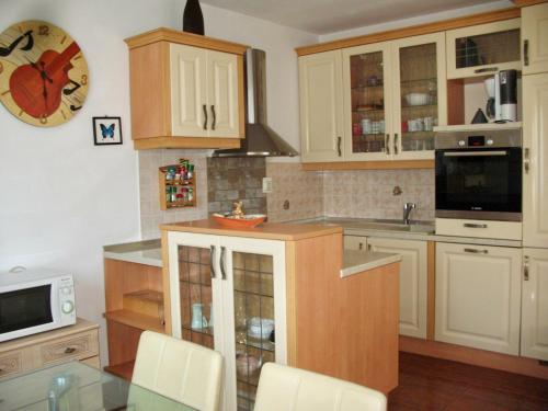 Kuchyň nebo kuchyňský kout v ubytování ZSA ZSA HOLIDAY HOME