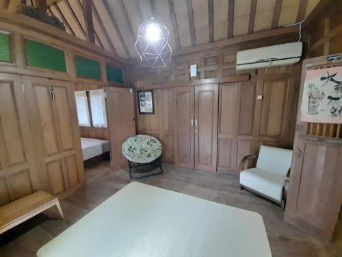 Ένα ή περισσότερα κρεβάτια σε δωμάτιο στο rumah566