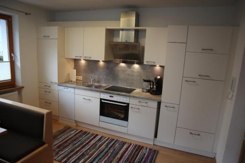 Una cocina o cocineta en Apart 83