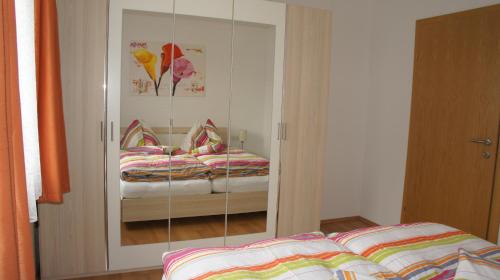 מיטה או מיטות בחדר ב-Bergblick