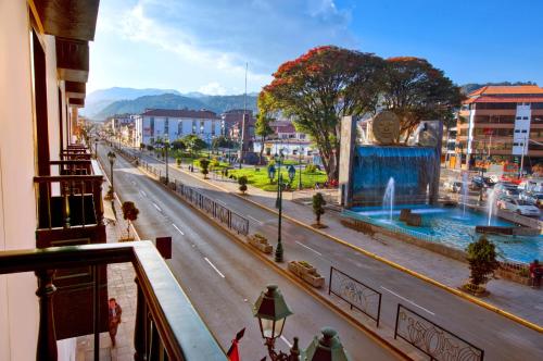a view from a balcony of a city street at Xima Exclusive Cusco in Cusco