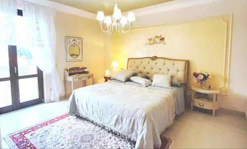 מיטה או מיטות בחדר ב-Villa Arya