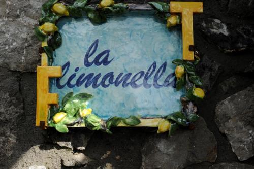 a cross with a sign that says la immortal at Fattoria La Tagliata in Positano