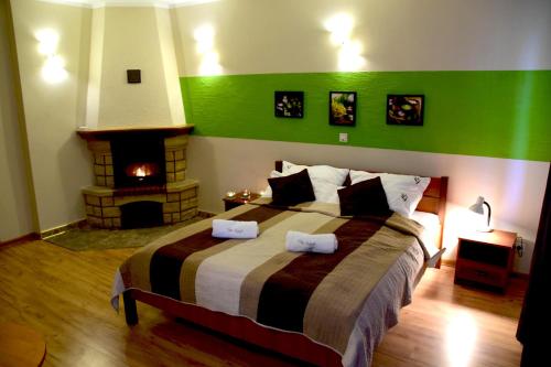 Tempat tidur dalam kamar di Villa Goździk