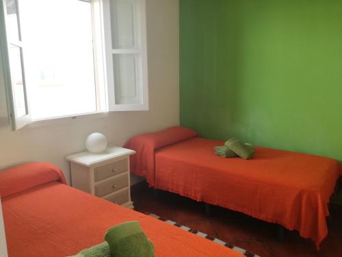 Кровать или кровати в номере Casa La Palomera 1