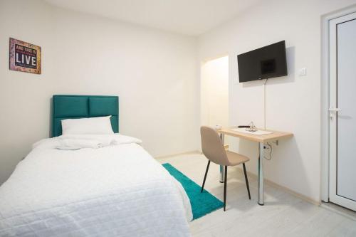 Cama o camas de una habitación en Cvetni trg