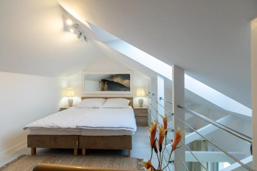 Postel nebo postele na pokoji v ubytování Apartament K2