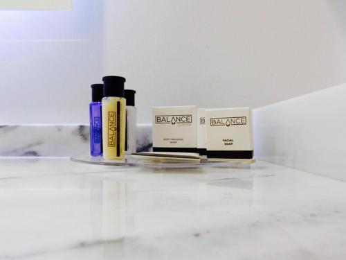 three products sitting on top of a counter at Staybridge Suites - Villahermosa Tabasco by IHG in Villahermosa