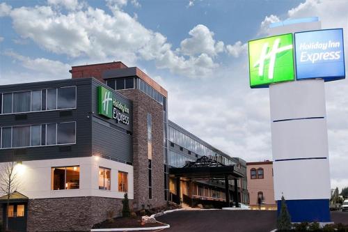 a building with a sign in front of it at Holiday Inn Express - Sault Ste. Marie by IHG in Sault Ste. Marie