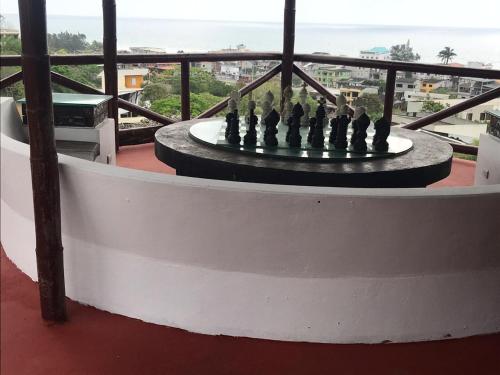a chess board on the balcony of a building at The Heights in Montañita in Montañita