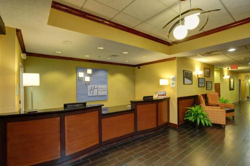 a lobby of a hospital with a waiting room at Holiday Inn Express & Suites Midwest City by IHG in Midwest City
