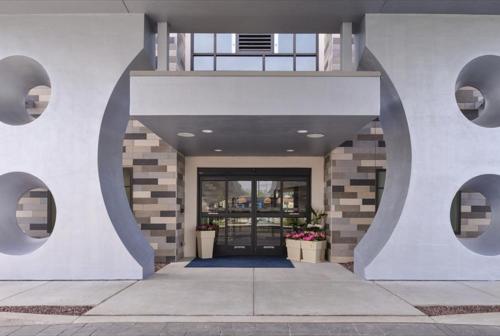 a lobby of a building with a door and windows at Holiday Inn Express & Suites Shippensburg by IHG in Shippensburg