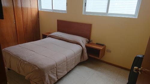 En eller flere senge i et værelse på San Marino 2