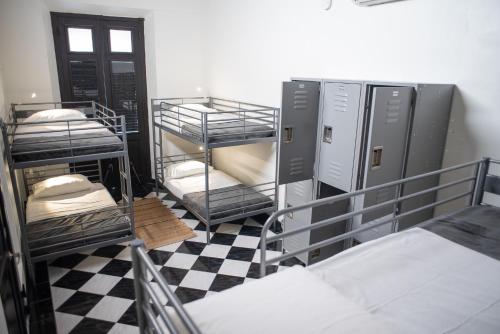 Postel nebo postele na pokoji v ubytování Fortel Hostel