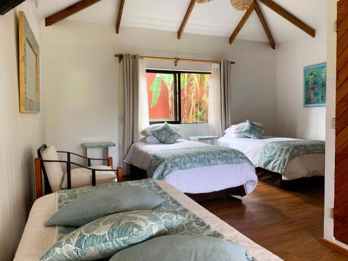 Postel nebo postele na pokoji v ubytování Pikera Uri Eco Lodge