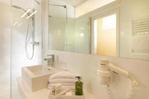 Koupelna v ubytování Dermuth Hotels – Hotel Dermuth Pörtschach