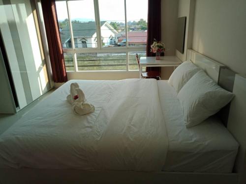 Katil atau katil-katil dalam bilik di เคทู เกสเฮาส์ (K2 Guesthouse)