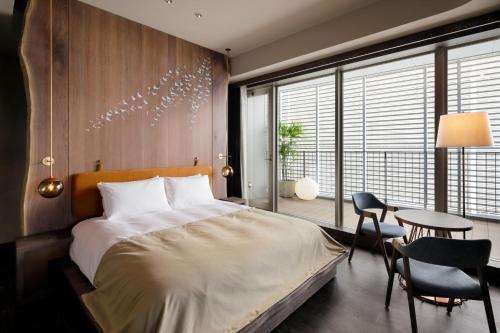 Voodi või voodid majutusasutuse GOOD NATURE HOTEL KYOTO toas