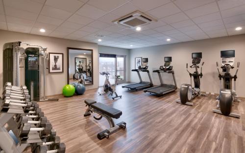 a gym with several treadmills and exercise machines at Staybridge Suites - Lehi - Traverse Ridge Center by IHG in Lehi