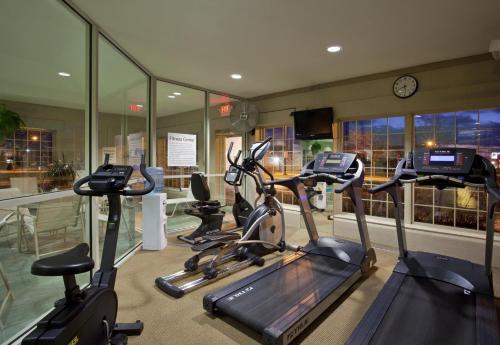 a gym with several exercise bikes in a room at Holiday Inn Express Hotel & Suites Delaware-Columbus Area by IHG in Sunbury