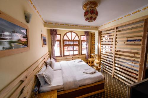 Postel nebo postele na pokoji v ubytování Hotel Pomelo House