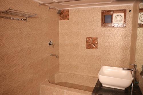 a bathroom with a toilet and a shower at PANCHHI'S NEST Villa in Amritsar