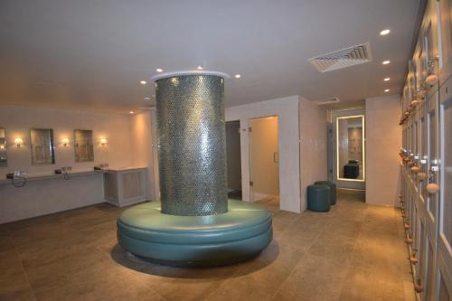 a room with a cylinder in the middle of a room at Lincombe Hall Hotel & Spa - Just for Adults in Torquay