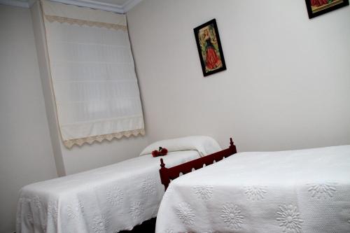 Ένα ή περισσότερα κρεβάτια σε δωμάτιο στο Chacón