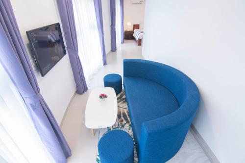 Χώρος καθιστικού στο Mermaid Seaside Hotel