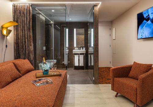 Axel Hotel San Sebastián - Adults Onlyにあるテレビまたはエンターテインメントセンター