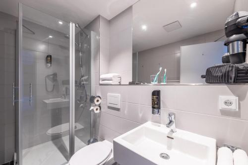 Koupelna v ubytování Serways Hotel Reinhardshain Nord