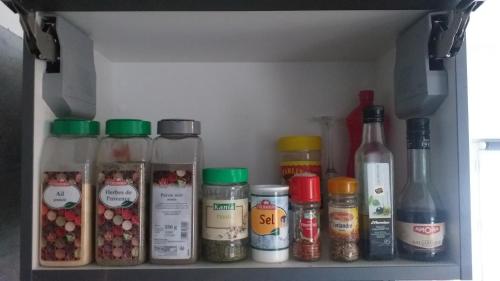 a drawer filled with different types of food items at Jacuzzi Romantique 15 min Etretat 1 in Fécamp