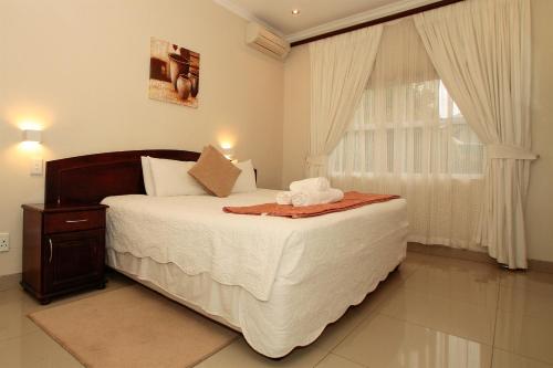 Cama o camas de una habitación en Addis Bed and Breakfast