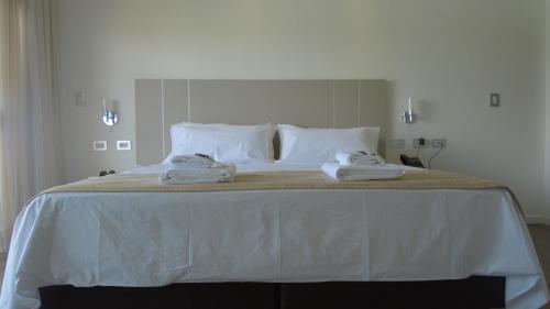 Ένα ή περισσότερα κρεβάτια σε δωμάτιο στο Hotel Cantera Respira Campo