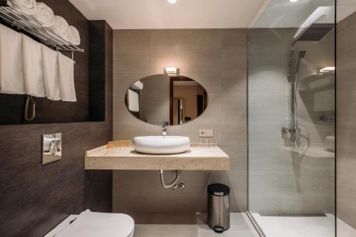 Ванная комната в Horizont Hotel Tbilisi