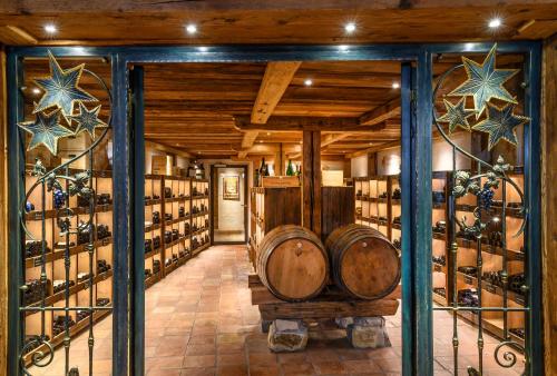 a wine cellar with a bunch of wine bottles at Landgasthof zu den drei Sternen in Brunegg