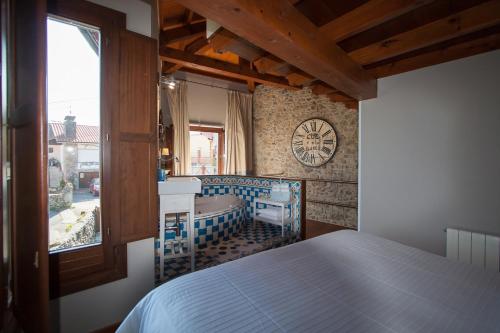 Ліжко або ліжка в номері Casa La Fragua