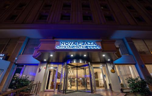 
a large building with a clock on the front of it at Nova Plaza Crystal Hotel & Spa in Istanbul

