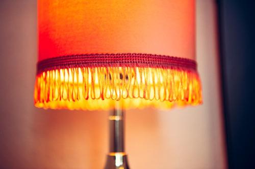 a close up of a red and yellow lamp at BnB prins Hendrik Venlo in Venlo