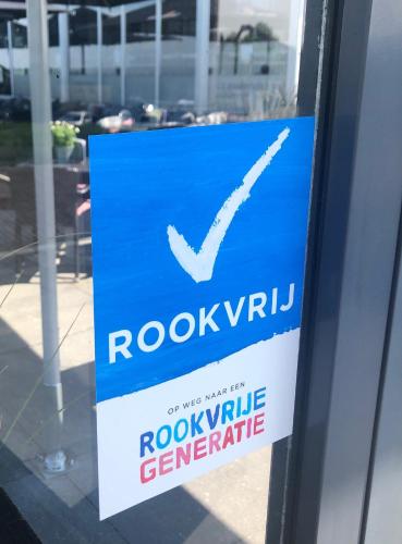 a sign in a window of a rockville centre at Churchill hotel Terneuzen in Terneuzen