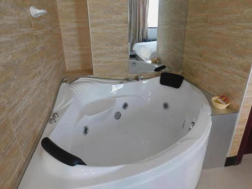 Ett badrum på Sunshine Hotel
