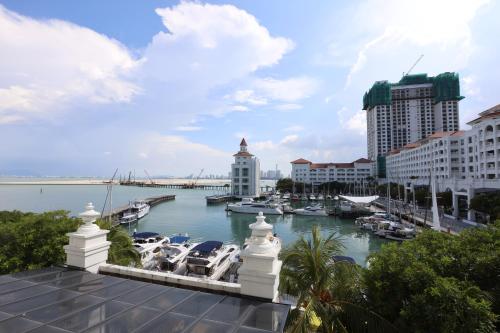a view of a marina with boats in the water at The Straits Quay Marina by Messina Clive in George Town