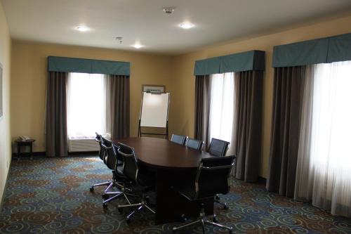 a conference room with a table and chairs at Holiday Inn Express Yorkton East by IHG in Yorkton