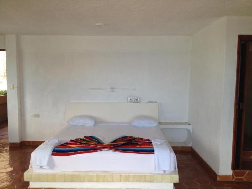 Ένα ή περισσότερα κρεβάτια σε δωμάτιο στο Safari Inn