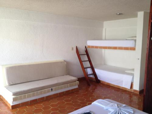 Ένα ή περισσότερα κρεβάτια σε δωμάτιο στο Safari Inn